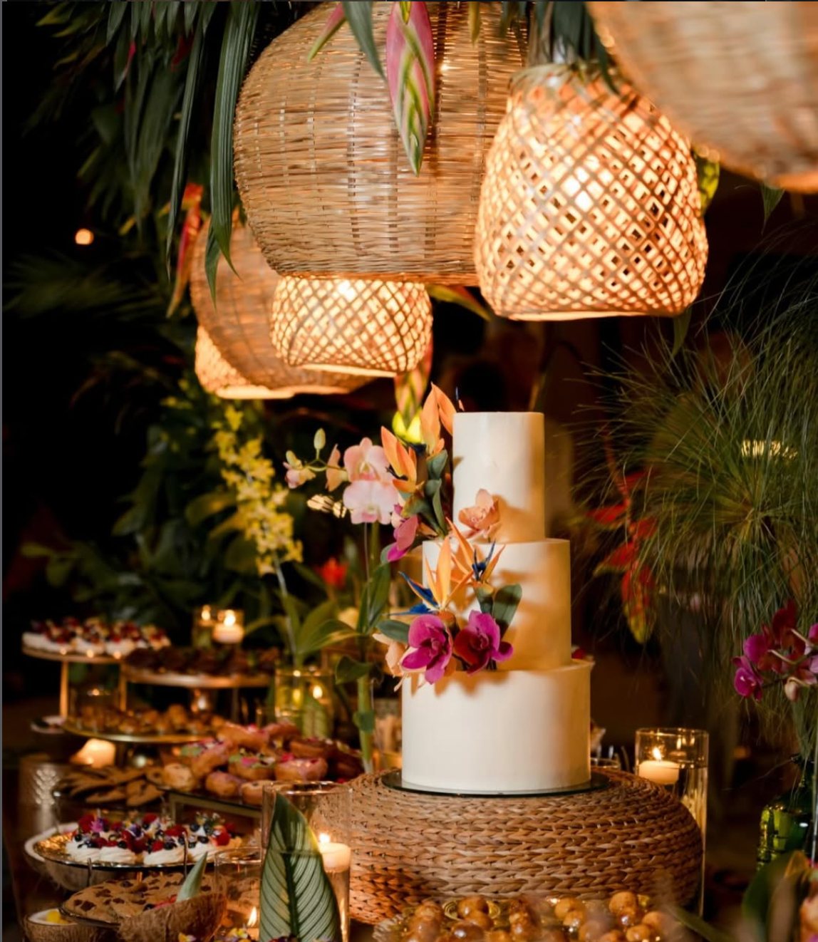 Wedding cake and dessert table by Dëli Café at a wedding in Guanacaste